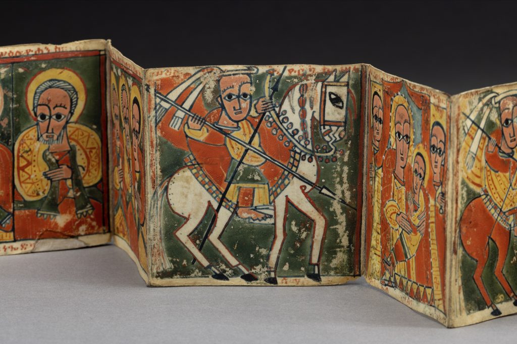 Artist in Ethiopia, Sensul (Folding icons) in original embossed leather case (detail), 15th-early 16th century. Parchment, pigments, and leather. Gift of Charles R. and Elizabeth C. Langmuir, 1979. E67892. Peabody Essex Museum. Photo by Kathy Tarantola/PEM.